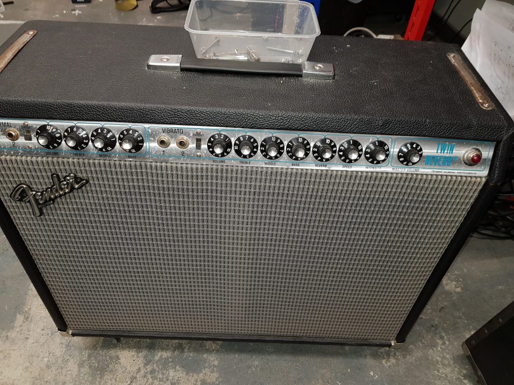 Fender Twin Reverb combo amp on the bench